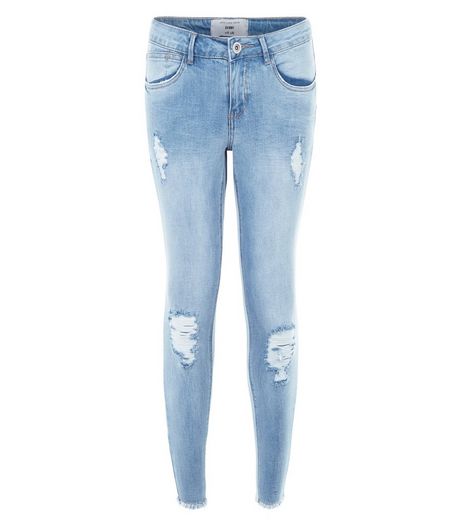 Petite 28in Light Blue Ripped Knee Raw Hem Skinny Jeans | New Look