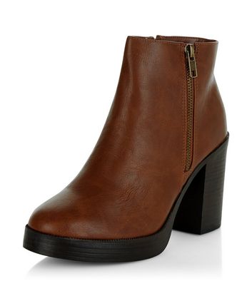 black ankle boots with tan heel