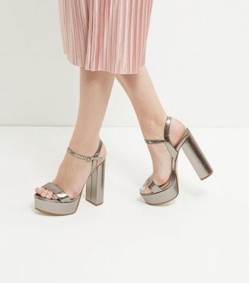 silver metallic platform heels