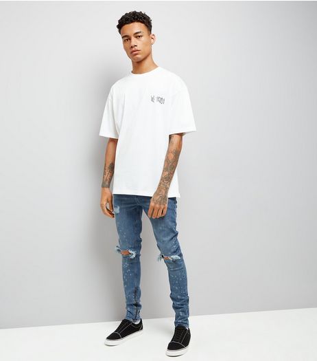 Blue Bleached Spray Ripped Knee Super Skinny Jeans | New Look