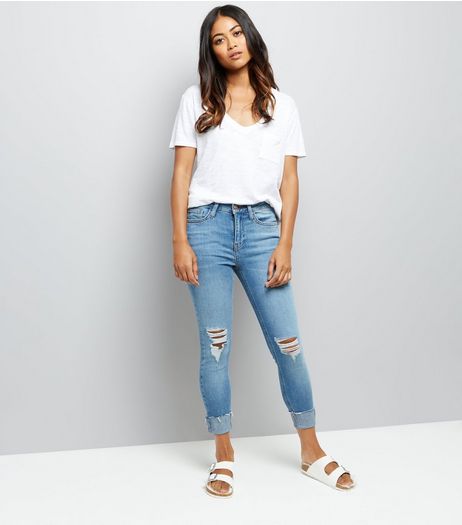 Petite Blue Ripped Knee Turn Up Relaxed Skinny Jeans | New Look