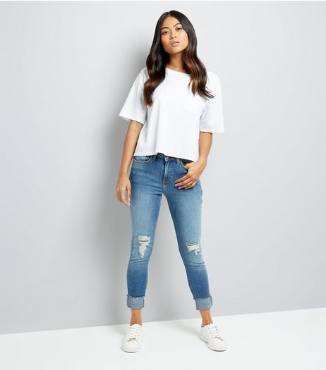Petite Blue Ripped Turn Up Relaxed Skinny Jeans | New Look